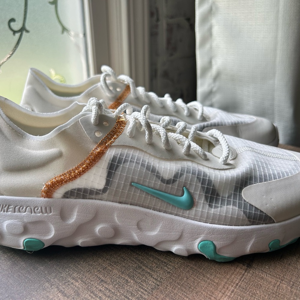 Nike Renew White and Teal Athletic Shoes. Worn one time.